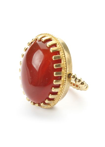 Reizender Exoal Ring mit rotem Achat in Cabochon-Schliff und goldener Fassung: Jetzt im Perlenmarkt OnlineShop bestellen! Exoal Schmuck wird aus Naturmaterialien hergestellt. Kleine Farbabweichungen sind deshalb möglich.