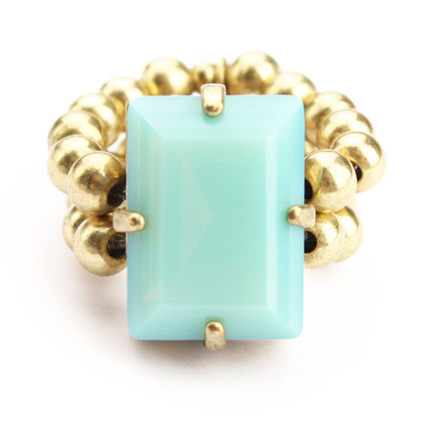 Entzückender Exoal Ring mit schlichter Kombination aus goldenen Perlen und türkisem Strass-Stein: Jetzt im Perlenmarkt OnlineShop bestellen! Exoal Schmuck wird aus Naturmaterialien hergestellt. Kleine Farbabweichungen sind deshalb möglich.